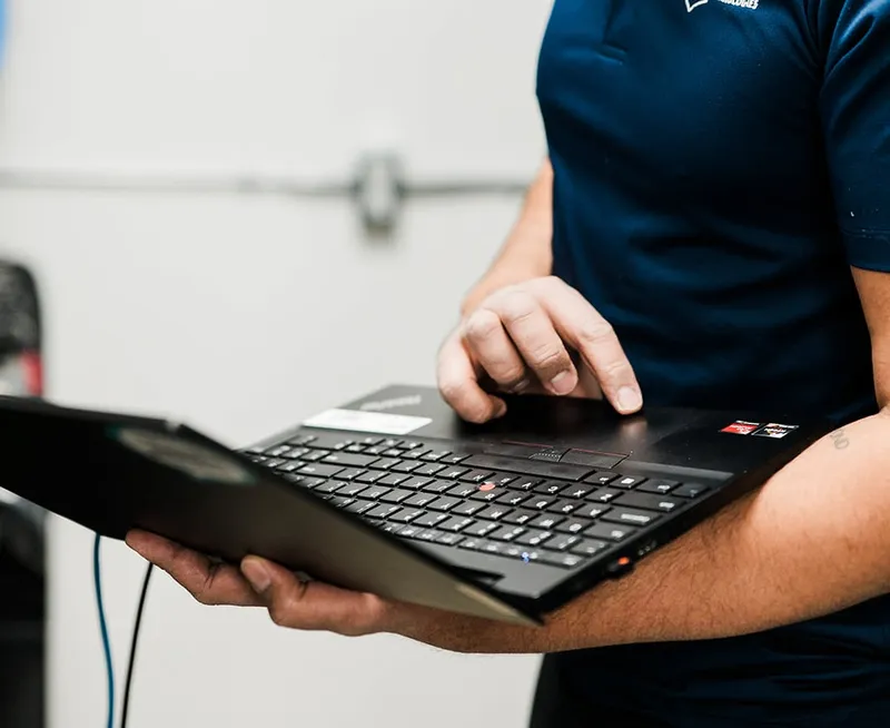 IT support professional helping with technology services